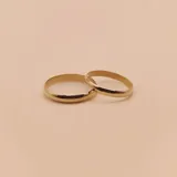 Par de alianzas bombé de oro amarillo 9k, de 3mm de ancho y 1mm de espesor.