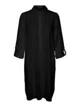 Vestido midi negro con cuello de camisa, mangas largas con puños plegables, cierre de botones y aberturas laterales.