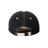 Gorra de béisbol negra con visera color crema y logo Rip Curl bordado en el frente.