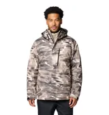 Campera Columbia Whirlibird V para hombre, con estampado camuflado en tonos beige y gris. Cuenta con tecnología Omni-Tech™ impermeable y transpirable, forro termorreflectante Omni-Heat™ y aislamiento Thermarator™.
