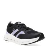 Championes negros con detalles en lila y blanco, con suela blanca con perforaciones.