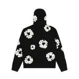 Campera con capucha y cierre frontal, color negro con estampado de coronas de algodón blancas.
