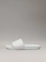 Chancletas Calvin Klein blancas con logo de la marca estampado en jacquard en la tira.