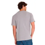 Remera gris de manga corta con estampa frontal de un camión animado y el logo de Caterpillar.