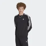 Buzo Adidas Adicolor Classic negro con cuello redondo y mangas largas con tres rayas blancas. Logo del trifolio bordado en el pecho.