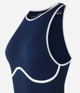 Body de lycra azul marino con textura acanalada, cuello redondo, sin mangas y bies contrastante blanco.