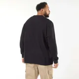 Sweater negro de punto canalé con cuello redondo y mangas largas.