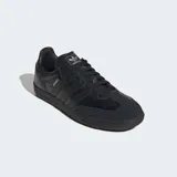 Championes Adidas Samba OG color negro, con exterior de piel con textura de cocodrilo, las tres tiras laterales en cuero liso y puntera de gamuza.