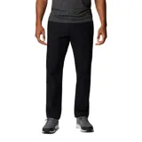 Pantalón de hombre color azul marino, de corte recto, con bolsillos laterales, bolsillos de seguridad con cierre y bolsillo para cuchillo. Confeccionado en tejido elástico con tecnología Omni-Shade UPF 50.