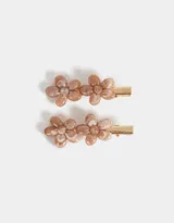 Set de dos hebillas para el pelo con apliques de flores color rosa claro.
