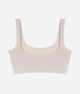 Soutien top color piel, confeccionado en poliamida con acabado seamless, escote en U y breteles anchos fijos.