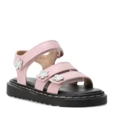 Sandalias rosas con plataforma negra y apliques de flores blancas.
