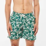 Short de baño verde con estampado de hojas color crema, cintura elástica y cordón ajustable.