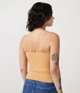 Musculosa verde de poliamida acanalada, con escote cuadrado y tirantes finos.
