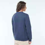 Buzo liso de cuello redondo color azul marino, confeccionado en felpa perchada.