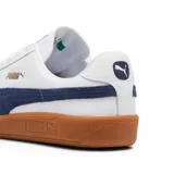 Championes Puma Army Trainer blancos con detalles en negro y gamuza gris. Suela de goma color caramelo.