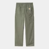 Pantalón negro de sarga de algodón orgánico, corte regular cónico, talle regular, con cinturilla elástica con cordón, inserción interior, bolsillos para herramientas, etiqueta cuadrada y bragueta con cremallera.