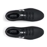 Championes de running Under Armour Charged Surge 4, color azul marino con logo blanco y suela blanca.