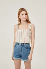 Musculosa con estampado a rayas verticales en tonos celeste, verde, rosa y blanco.