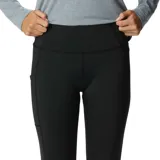 Calza deportiva negra de tiro alto, confeccionada en poliéster reciclado y elastano, con tecnología Omni-Wick™ y bolsillo lateral en la pierna.