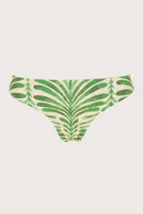 Calzón de bikini reversible con estampado de hojas de palmera verdes sobre fondo blanco.