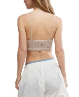 Bralette negro de encaje con tirantes finos y diseño seamless.