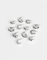 Set de seis pares de aros argollas doradas con diferentes diseños.