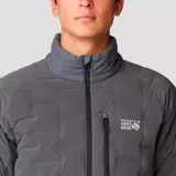 Campera gris con cierre frontal, bolsillos laterales con cierre y logo de la marca en el pecho.