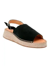 Sandalia de cuero negra con plataforma de yute y tira trasera ajustable.
