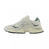 Championes urbanos New Balance modelo 9060, color verde azulado con detalles en blanco, confeccionados en gamuza y malla, con logo "N" característico en los laterales y entresuela con tecnología ABZORB y SBS.