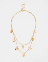 Collar corto dorado de doble cadena con dijes de mariposas.