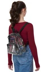 Mochila mini transparente con detalles en color lila pastel, marca JanSport.