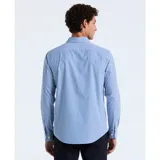 Camisa de manga larga de poplin con rayas verticales azules y blancas, con cuello abotonado y bolsillo en el pecho.