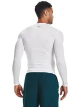 Remera de compresión Under Armour HeatGear de manga larga, color negro con logo blanco en el pecho.
