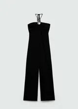 Mono largo negro con tirantes finos, escote halter con anilla metálica y cierre de cremallera en la espalda.