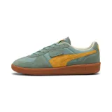 Zapatillas bajas de hombre en color verde con detalles en amarillo, diseño casual.