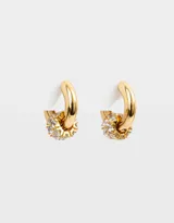 Aros tipo argolla bañados en oro con circonitas cúbicas.