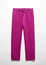 Pantalón crop color fucsia de tejido de lino, tiro medio, cintura elástica con lazo, diseño jogger y bolsillos laterales.