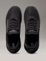 Zapatillas urbanas Calvin Klein Jeans modelo Eva Runner, color negro, confeccionadas en malla reciclada y material sintético, con logo en el lateral.