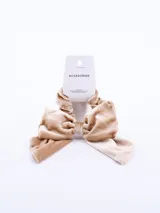 Colero beige de terciopelo con moña grande.