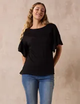 Blusa negra de algodón texturado, marca Ruby Rd, con manga corta amplia y cuello redondo.