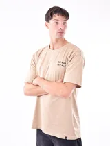 Remera color beige de corte oversized con estampado en el pecho que dice "Get a bike get a life".