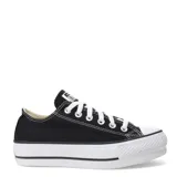 Championes urbanos Converse Chuck Taylor All Star Lift, color negro con plataforma blanca, capellada de lona de algodón, etiqueta tejida en la lengüeta y puntera de goma.