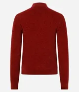 Blusa de chenille color rosa claro, con cuello alto y mangas largas.