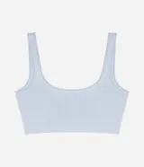 Soutien top negro de poliamida con acabado seamless, escote redondo y breteles anchos fijos.