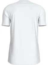 Remera blanca de algodón con cuello redondo y mangas cortas. Estampado frontal con el logo "Calvin Klein Jeans" en color negro.