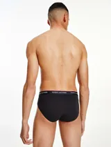 Pack de tres slips negros de algodón elástico con cintura elástica con logo Tommy Hilfiger.