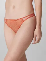 Colaless de encaje color coral con cintura elástica y laterales de tul.