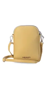 Bandolera pequeña de símil cuero color terracota, con solapa frontal y correa fina ajustable.