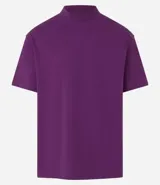 Remera blanca de algodón, corte holgado, cuello redondo alto, manga corta y sisas caídas.